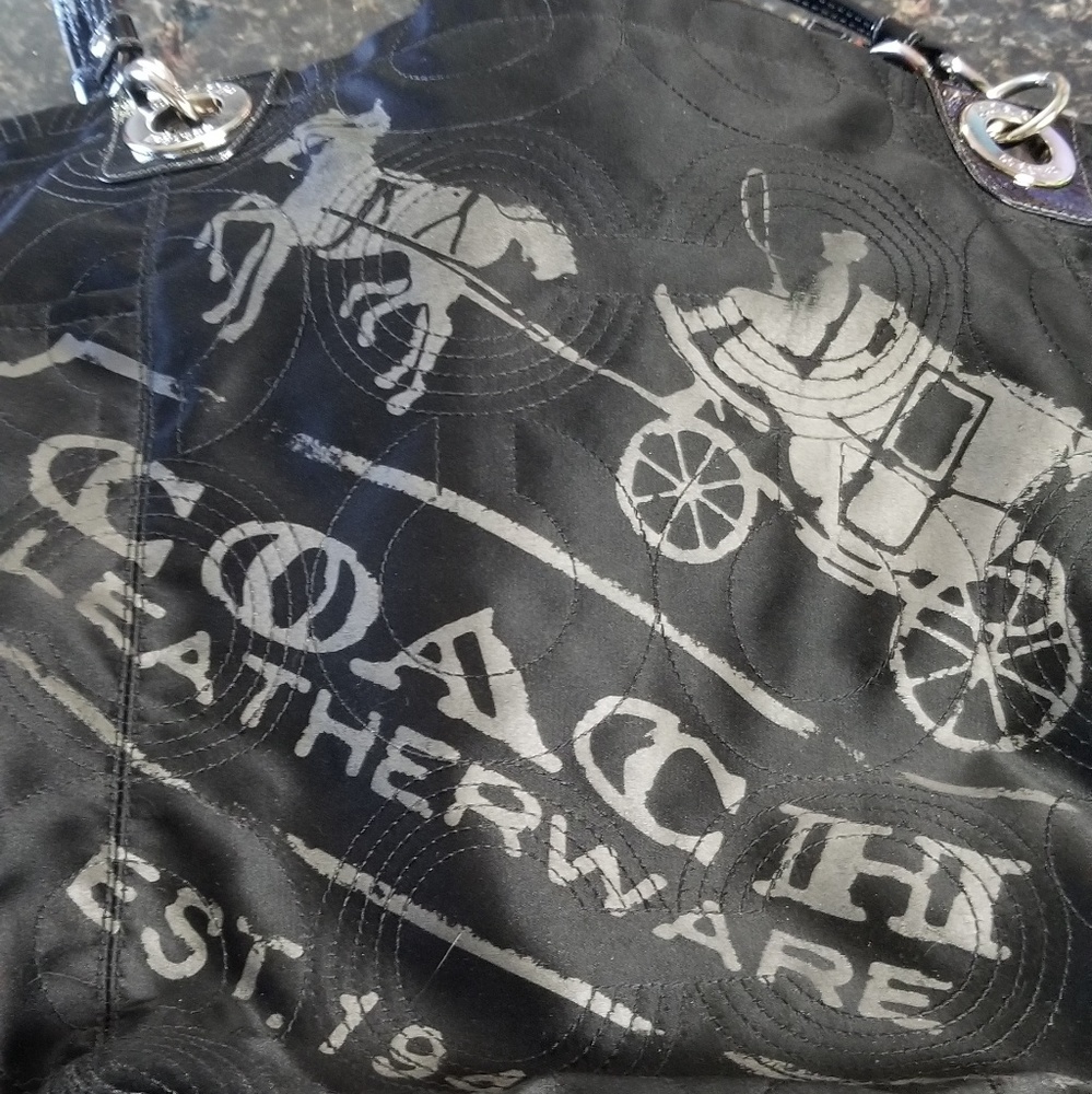 Coach black tote with horse & carriage.